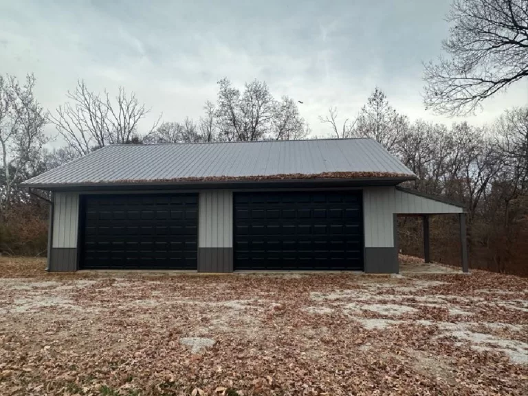 Gray Pole Barn With 2 Garage Doors